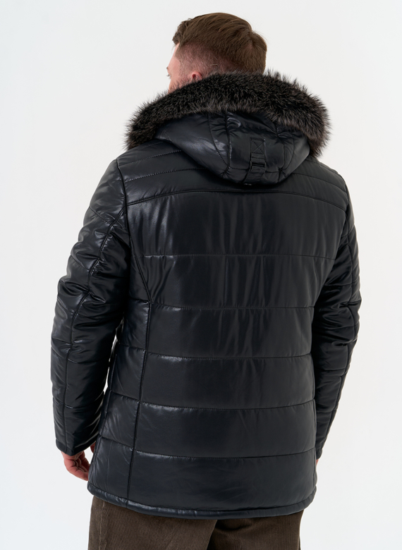 Пуховик из эко кожи с капюшоном из меха енота